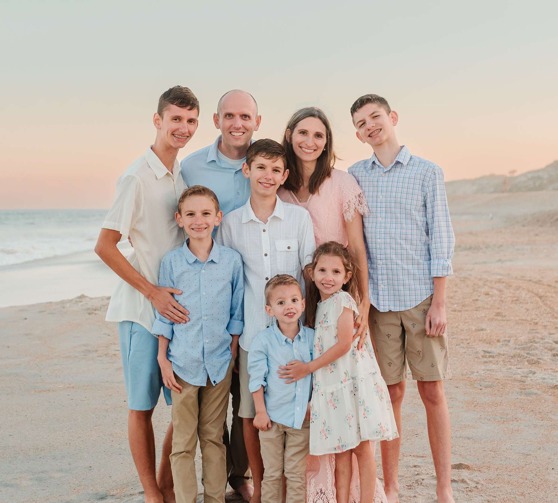 The Dent family on the beach at sunset in Ponte Vedra Beach, Florida