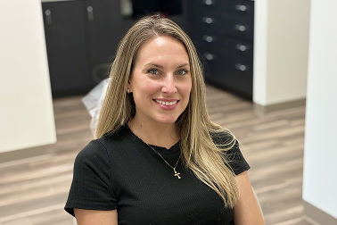 Smiling adult at Sunrise Orthodontics